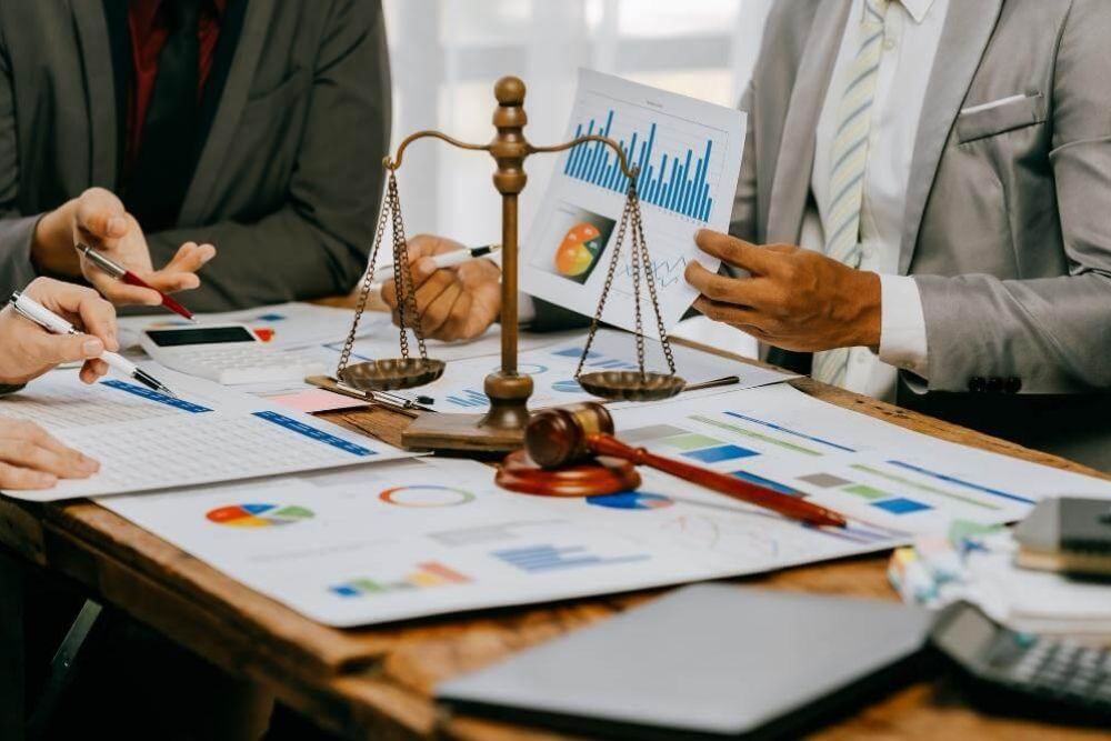A group of people discussing accounting services for law firms