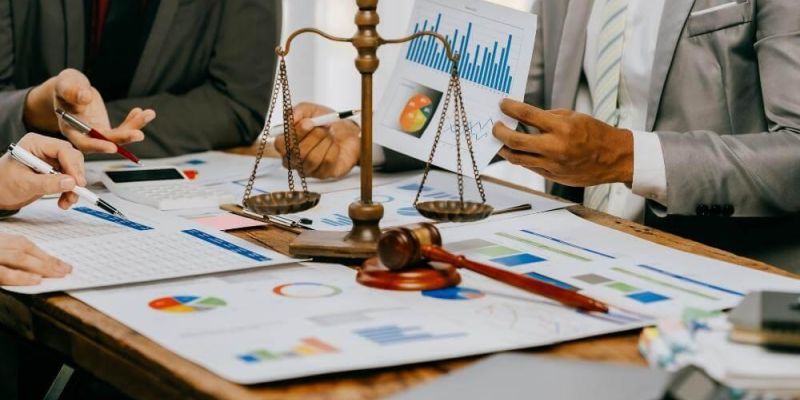 A group of people discussing accounting services for law firms